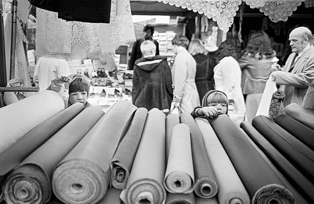 22. Peeking over the Fabric Rolls, Stockport Collection
